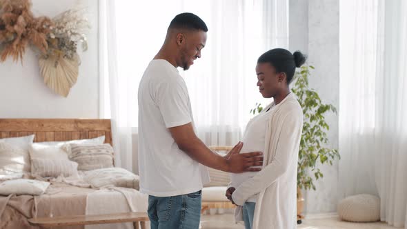 Young Parents Married African Couple Afro American Black Ethnic Family Stand in Home Interior Man