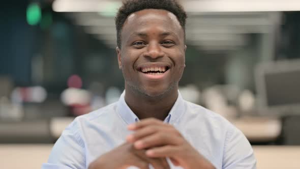 Portrait of African Businessman Talking on Online Video Call