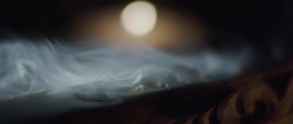 Macro shot of white incense smoke alt
