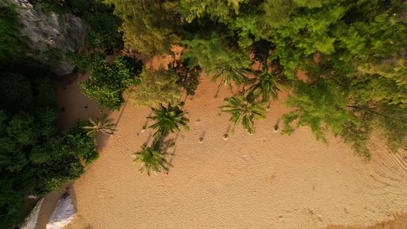 4K aerial drone top view of beautiful beach at sunrise.