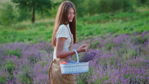 Smiling Woman Walking with Basket Lavender Field