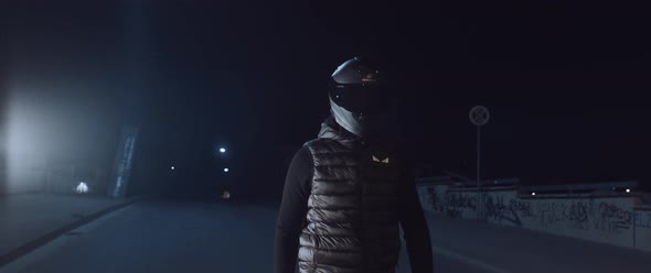 Motorbike driver at night