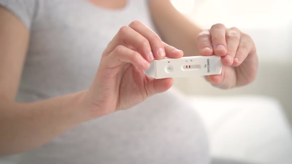 Pregnant Woman Making Test