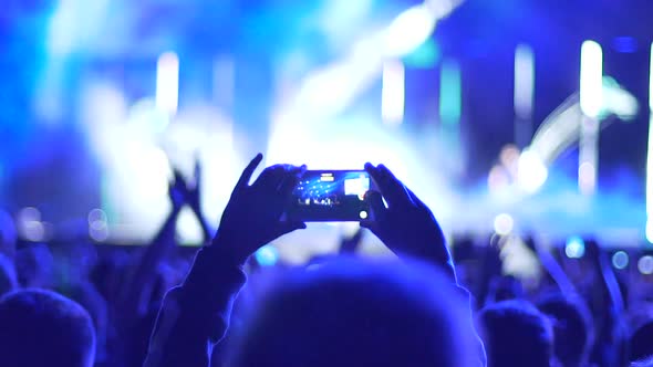 Atmosphere at Fantastic Concert, Excited Fan Filming Performance on Gadget