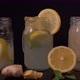 Lemonade Being Poured In Jar With Ginger And Lemon Slices - VideoHive Item for Sale