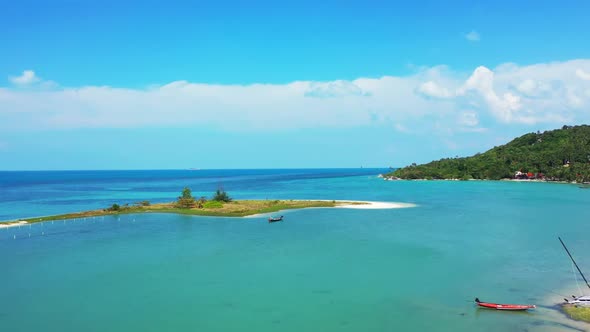 Aerial drone view seascape of relaxing lagoon beach wildlife by shallow ocean and clean sand backgro