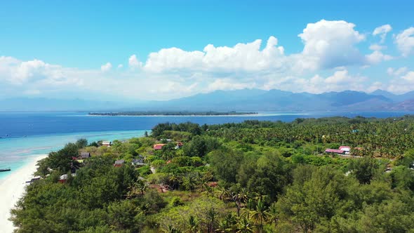 tropical Gili Island in Lombok, aerial panorama, sky and mountains in the background