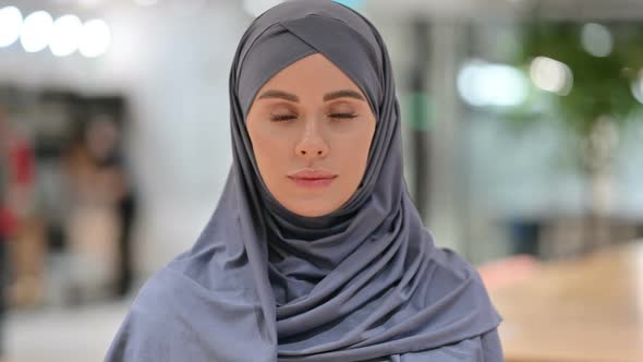 Serious Arab Woman Looking at the Camera