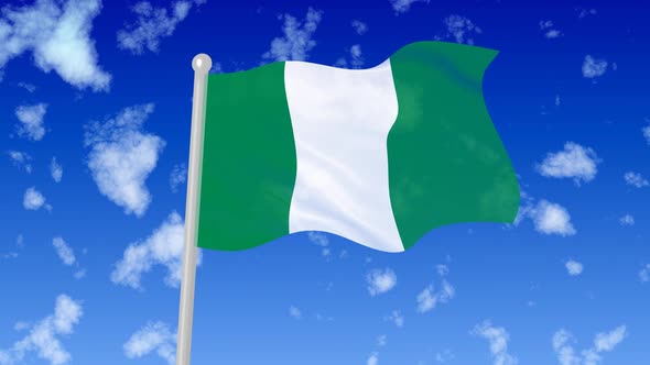 Nigeria National Flag Flying Wave In The Sky With Clouds