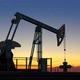 Oil Pump Jack Extracting Crude Oil Under Starry Sunset Sky - VideoHive Item for Sale