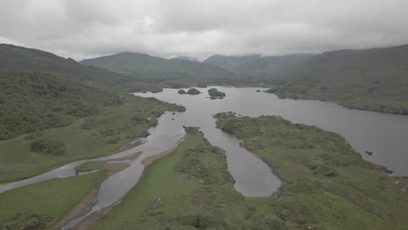 Beautiful Scenery Of Nature With Calm Lake Surrounded By Forest Mountains In The Gap Of Dunloe, Coun