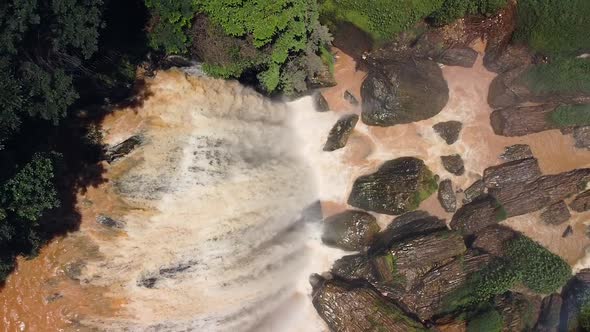 Drone View of Waterfall with Dirty Water in the Rainforest.