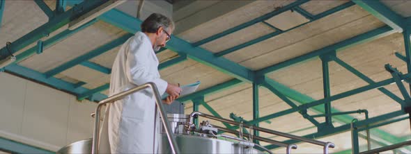 Scientist analyzing beer fermentation