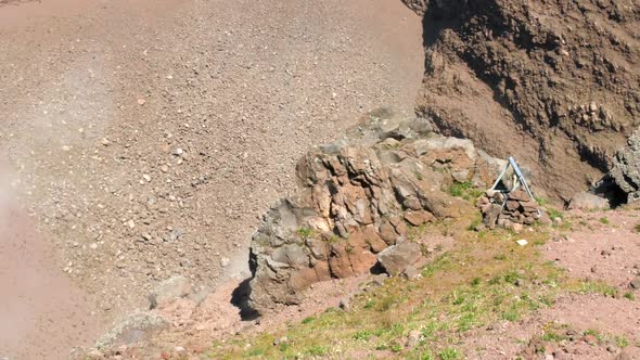 Close up shot of smoke coming out of the crater of Mount Vesuvius, which is a somma-stratovolcano lo