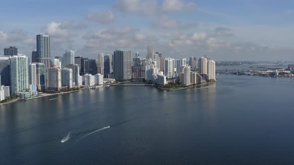 Wide aerial sweep of downtown Miami revealing much of the downtown location and then revealing the p