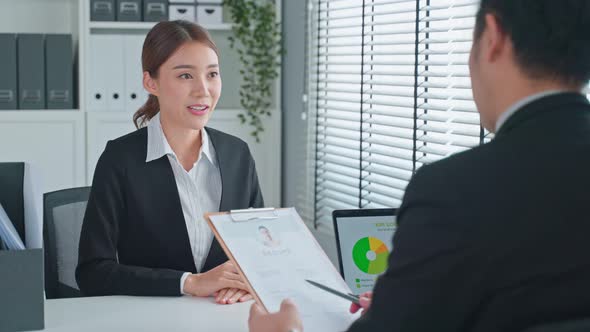 Close up of woman give resume to hr manager for job interview and apply job at office workplace.