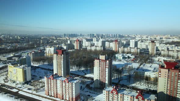 City quarters. Multi-story houses. Winter cityscape.