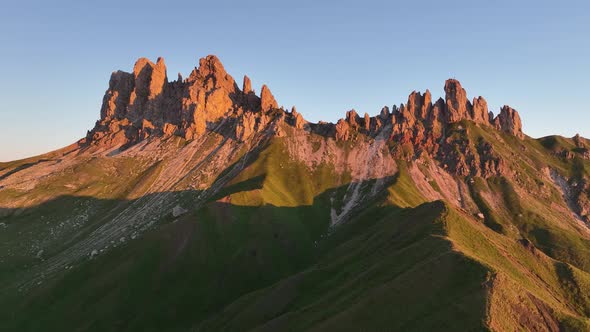 Dolomites mountains peaks on a summer sunrise