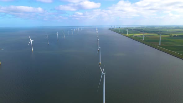 Wind Turbines in the Early Morning Wind Mill Park in the Netherlands