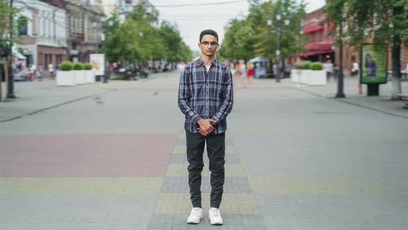 Time Lapse Portrait of Handsome Arab Man in Casual Clothing Outdoors in City Street Standing Alone