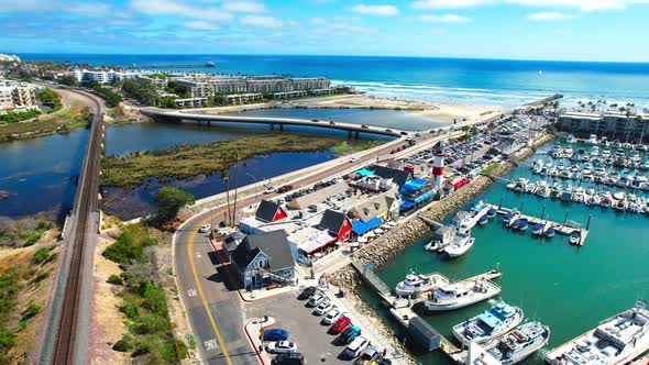 Oceanside Coast Drone Shot with Harbor and Train Tracks