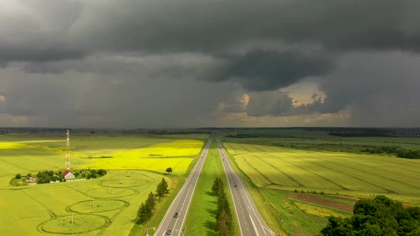 The storm clouds over the highway, view from a drone