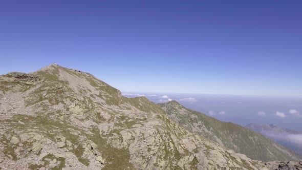 Italy Alps Mountains Aerial on Rocky Side in Summer Sunny Day