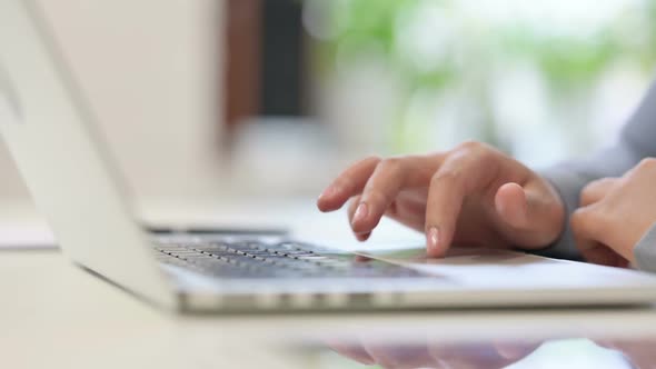 Hands Close Up of African Woman Using Laptop