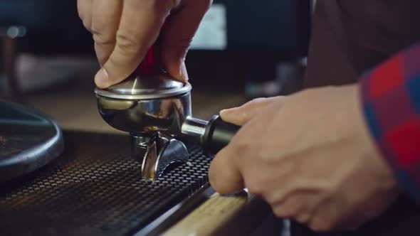 Pressing Coffee with Tamper