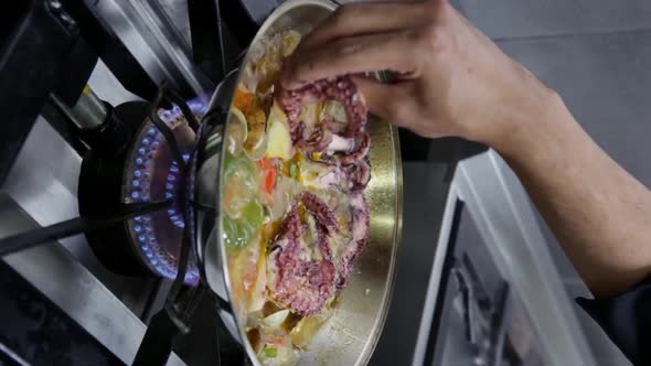 Chef Cooks a Cataplan with Octopus Seafood Vegetables