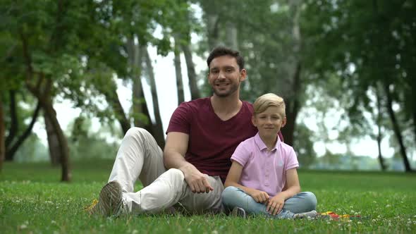 Man and Boy Show Thumbs Up, Social Support for Single Parent Family, Wellbeing