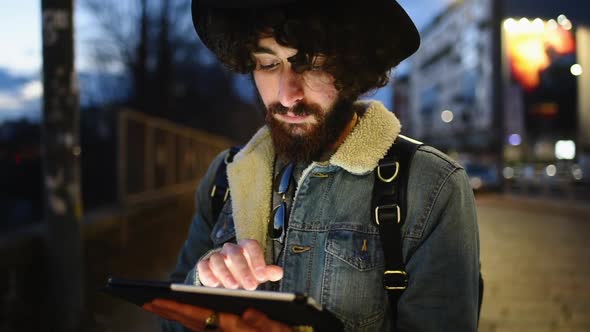 Man using digital tablet