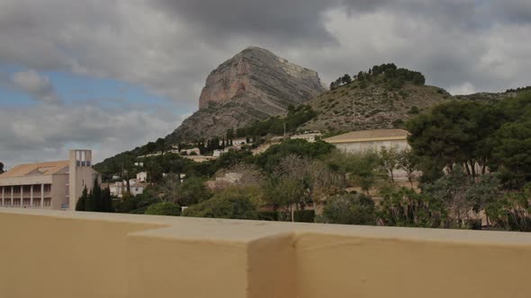 Mountain Time-Lapse on cloudy day with dolly motion - Slow camera motion