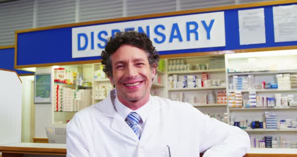 Pharmacist standing at counter