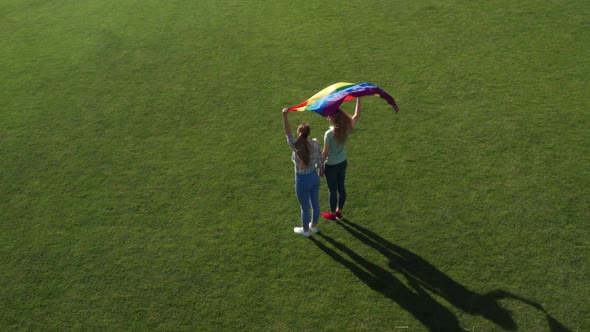 Drone Flight Over Gay Couple Holding Lgbt Flag