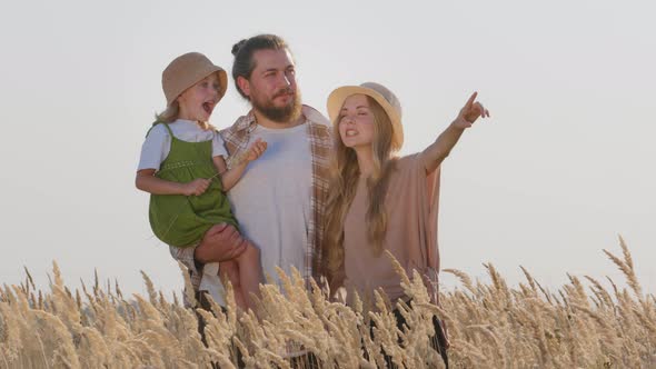 Happy Caucasian Family Parents with Small Daughter Bearded Man and Blonde Woman Father Mother and