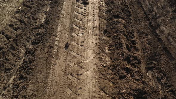 Dirt road mud after raining day 4K drone video