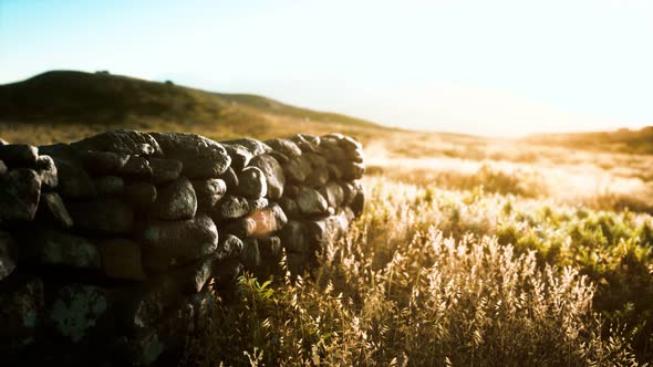 Scottish Land Border Stone Wall at Sunset