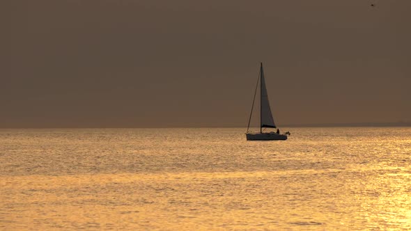 Beautiful Lonely Yacth Sailing at Sunset. FHD, 