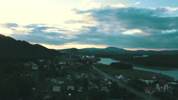 Aerial View Tourist City in the Mountains Under the Clouds