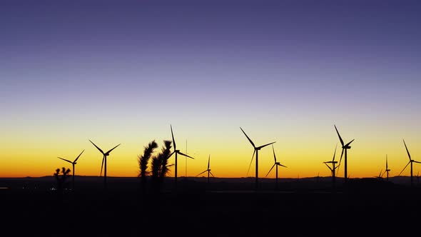 Windmills at sunrise, mojave desert