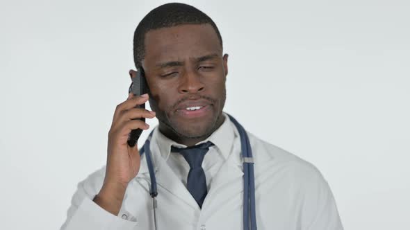 African Doctor Talking on Phone  White Background