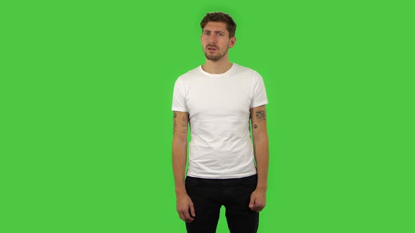 Confident Disappointed Guy Looking at Camera. Green Screen