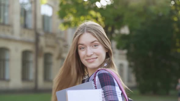 Portrait of Pretty Looking Young Woman Having Fun, Rejoicing Ang Joking