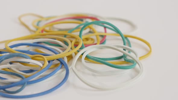 Ring shaped rubber bands  close-up 4K tilting video