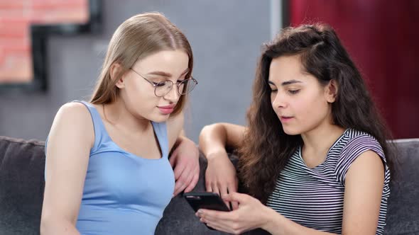 Two Happy Smiling Young Girl Friend Gossiping Chatting Having Positive Emotion Medium Closeup