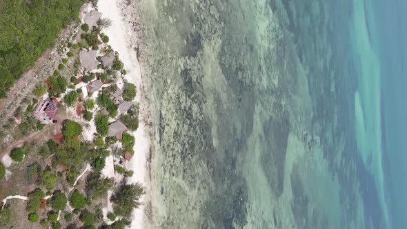 Vertical Video of Low Tide in the Ocean Near the Coast of Zanzibar Tanzania Aerial View