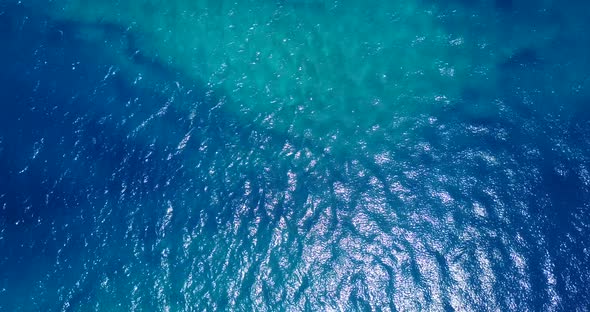 Wide angle above abstract view of a white paradise beach and turquoise sea background in colourful 4