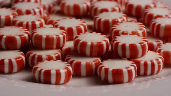 Rotating shot of peppermint candies - CANDY PEPPERMINT 069