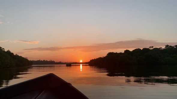 Boat safari at the sunrise in lake in Sri Lanka